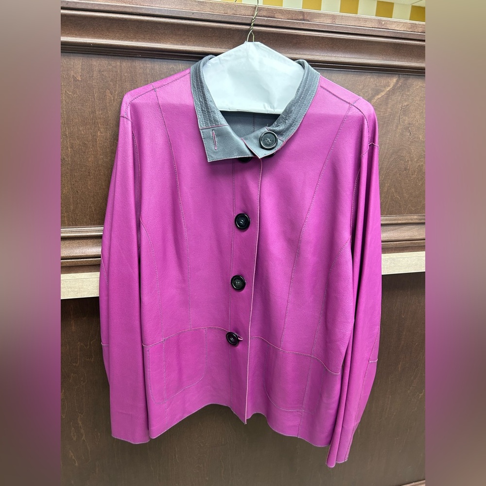 Reversible leather jacket. Wear the purple side or gray side.